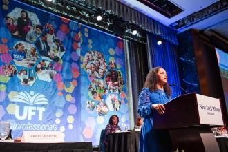 UFT Paraprofessionals Chapter Chairperson Priscilla Castro addresses her members at the 2025 UFT Paraprofessionals Awards Luncheon on March 22, 2025. 