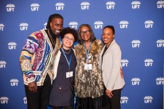 Honoree  Sonia A. Riley (second from right), a paraprofessional at Brooklyn’s Kurt Hahn Expeditionary Learning School, celebrates with members of her family at the 2025 UFT Paraprofessionals Awards Luncheon on March 22, 2025. 
